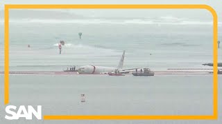 US Navy plane overshoots runway in Hawaii lands in the water [upl. by O'Meara]