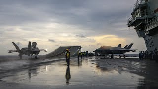 Jets fly from HMS Queen Elizabeth in rainy conditions in the Bay of Bengal [upl. by Haig751]