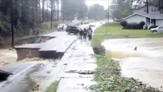 Woman survives SC floods by clinging to cross [upl. by Romelda51]