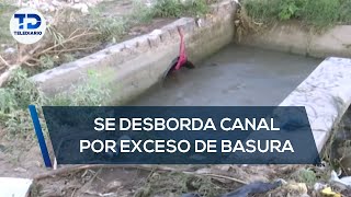 Se desborda canal de riego por exceso de basura [upl. by Beaver]