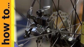 How To Adjust Mechanical Disc Brakes  Halfords UK [upl. by Aicxela]