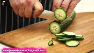 Chopping a cucumber  Jamie Olivers Home Cooking Skills [upl. by Murrah415]