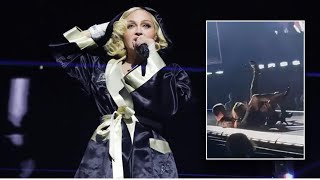 Madonna Suffers A Fall From A Chair During Her Concert In Seattle [upl. by Barcellona27]