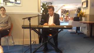 Simon May playing Howards Way Theme tune at his book signing at the Yvonne Arnaud Theatre [upl. by Dilahk]