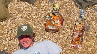 Filling bottles with micro seashells at high tide Beach combing for rare tiny seashells [upl. by Rufe]