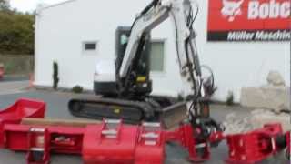 Bobcat E55 mit hydraulischem Schnellwechselsystem Martin MQuick [upl. by Peugia]