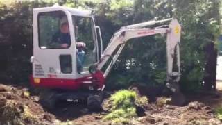 Takeuchi TB016 Mini Digger Excavator digging [upl. by Kjersti]