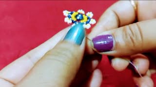 Easy earrings makingHandmade jewellery at homeSimple earrings with seed beadsপুতির দুল [upl. by Hgielsa771]