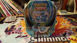 vaporeon ex tinpokemon pack opening [upl. by Shiller500]