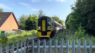 Class 158834 passing Rossett foot Crossing 01082024 [upl. by Notniw]