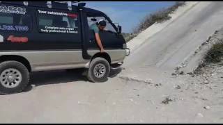 Mitsubishi Delica L300 climbing a steep cement grade [upl. by Yadnil]