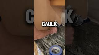 Caulking before spraying kitchen cabinets [upl. by Meibers]