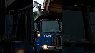 Garbage truck holds trash on its cab shield [upl. by Twum469]