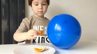 How To Pop Balloons With An Orange Peel [upl. by Rabjohn]