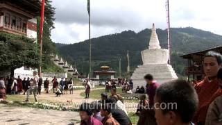 Monastery wall covered with Thangka during the Tsechu festival in Bhutan [upl. by Ahsienad]