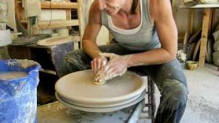 How to throw a large platter on the potters  pottery wheel [upl. by Hartfield]