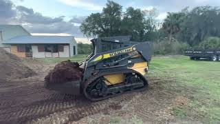 New Holland L185 wheeled skid steer with Loegering tracks [upl. by Hoopen]