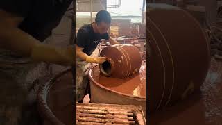 Glazing a ceramic wine jar [upl. by Eelarol449]