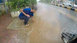 Unclogging Culvert Drain Rain Water On Street Road [upl. by Baggett]