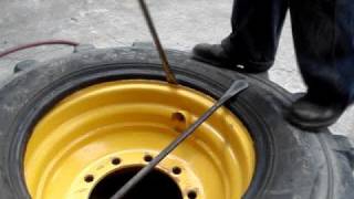 Backhoe tire dismounting 195 L24 [upl. by Russo946]