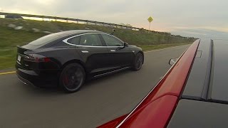 Tesla Model S P85D 691HP vs P85 415HP 35 MPH Roll Race [upl. by Ahsiuqet908]