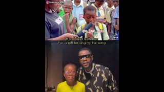 Kizz Daniel pour me water on the street by a little girl [upl. by Toffic]