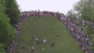 The Annual Cheese Rolling event on Coopers Hill Gloucestershire [upl. by Ylrbmik159]