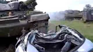 Tank crushes car 17  tank coming off view 2 [upl. by Edlun75]