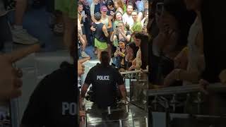 Cop Slides Down Escalator to Applause from Concert Crowd [upl. by Harte272]