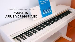 Yamaha ARIUS YDP 144 Piano Unboxing Assembly and First Use [upl. by Intirb931]