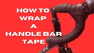 How to wrap a handlebar tape on a road bike [upl. by Croix]