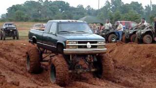 MUD TRUCKS Chevy Silverado on 54quot BOGGERS MUD BOGGIN [upl. by Lyj]