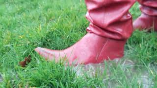 Red stiletto boots on a wet day 3  waterlogged grass [upl. by Aztirak]