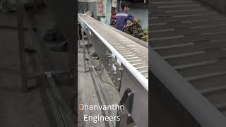 Slat Conveyor  Dhanvanthri Engineers Pvt Ltd engineering conveyorsystems [upl. by Yesima993]