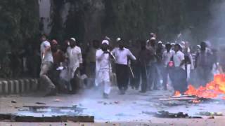 Bangladesh riots Islamist hardliners fight with police [upl. by Ahsitauq]