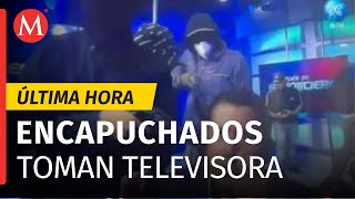 Encapuchados toman canal de televisión en Ecuador mantienen a empleados rehenes [upl. by Ardnasil]