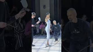 BellaHadid under 10 minutes naked on stage spray liquid that solidified into a dress [upl. by Acsisnarf]