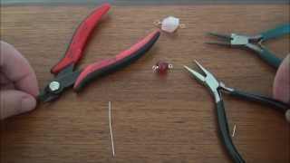 Basic Wire Wrapping Techniques How to Make a Simple Wire Wrapped Loop [upl. by Mathre]