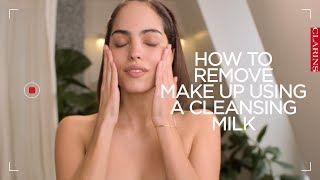 How to remove make up using a cleansing milk  Clarins [upl. by Acirema772]