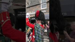 Drum Major Esson leads combined Pipe Bands on the march through Tomintoul to Highland Games shorts [upl. by Hasseman880]