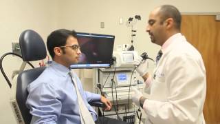 Laryngoscopy and stroboscope to examine the vocal cords [upl. by Delphinia]