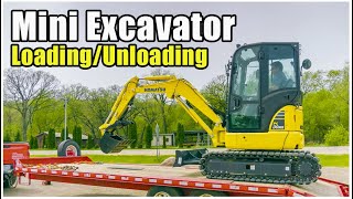 How to LoadUnload a Mini Excavator  Heavy Equipment Operator Training [upl. by Aenej]