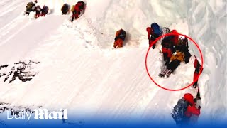 Tragic moment climbers pass a dying Pakistani porter on K2  the worlds second highest mountain [upl. by Alleda]