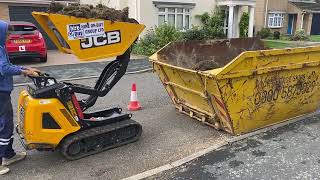 JCB skip loading mini dumper [upl. by Aleibarg]