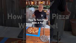 How To Turn Pizza With A Peel 🍕 pizza pizzatime pizzamaking pizzalover pizzatower food [upl. by Pauiie]