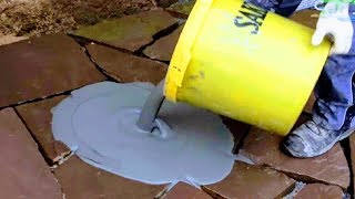 HOW TO LAYGROUT FLAGSTONE SLABS  PRO GROUTING NATURAL STONE SAND JOINTS MASONRY PATIO PAVERS WORK [upl. by Nitsud73]