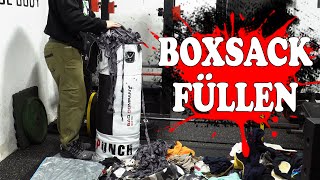 Boxsack füllen und aufhängen und die richtigen Boxhandschuhe [upl. by Gombach580]