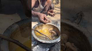 Hadzabe older man enjoying his food food hadzabetribe villagelife [upl. by Boarer200]