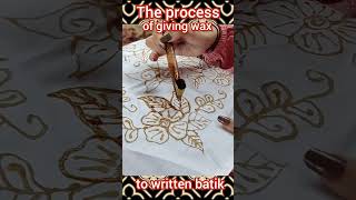 the process of giving wax to written batik shorts batik batiktradisional [upl. by Akeenat]