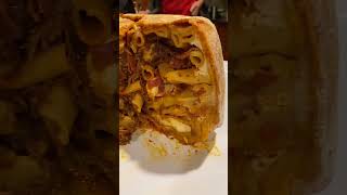 Serving Stanley Tuccis Family Timpano Recipe [upl. by Enttirb]